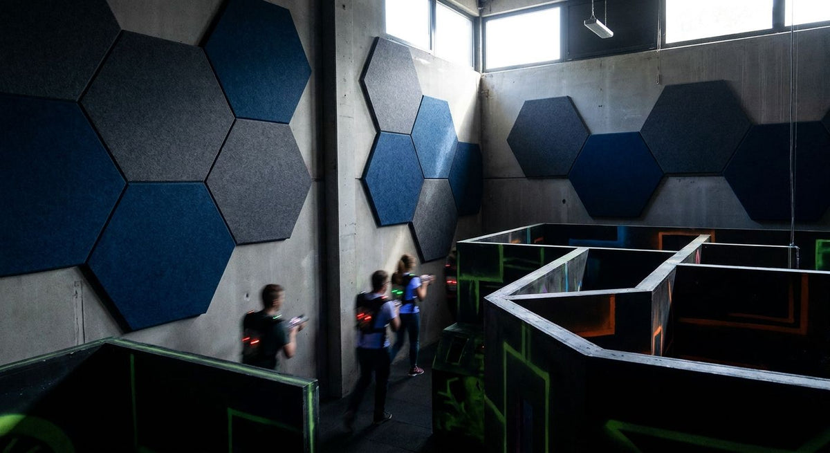 Acoustic panels for laser tag arena walls