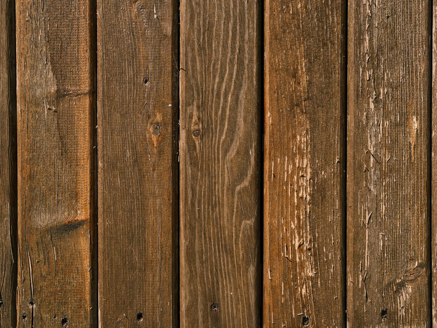 Close-up view of rustic wooden planks with natural grain and texture.